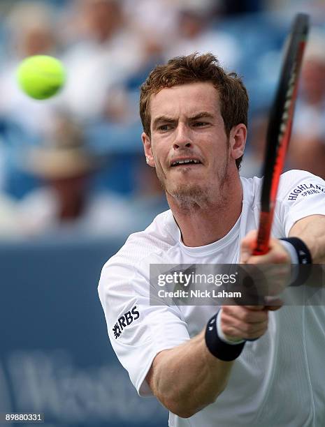 Andy Murray of Great Britain hits a backhand against Nicolas Almagro of Spain during day three of the Western & Southern Financial Group Masters on...