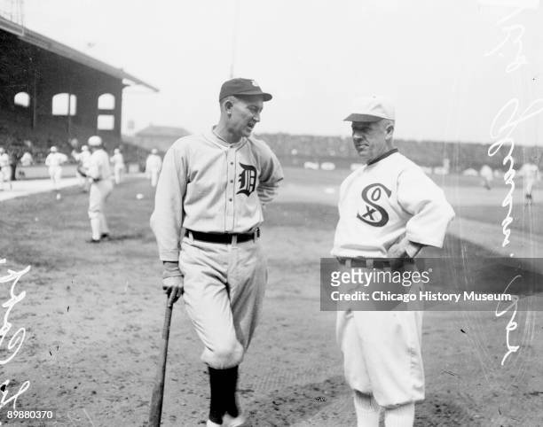 Informal three-quarter length portrait of baseball legend Ty Cobb , of the American League's Detroit Tigers, and baseball manager Kid Gleason , of...