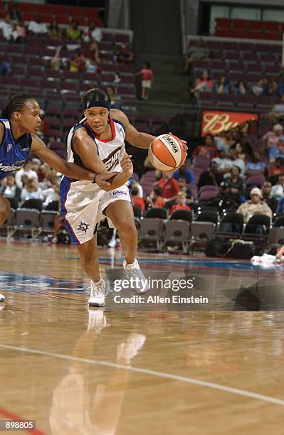 Edwina Brown of the Detroit Shock is defended by Elaine Powell of the Orlando Miracle during the game on June 21, 2002 at the Palace of Auburn Hills...
