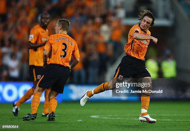 Stephen Hunt of Hull celebrates his goal during the Barclays Premier League match between Hull City and Tottenham Hotspur at the KC Stadium on August...