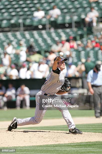 Huston Street of the Colorado Rockies pitches during the game against the Oakland Athletics at the Oakland Coliseum on June 28, 2009 in Oakland,...