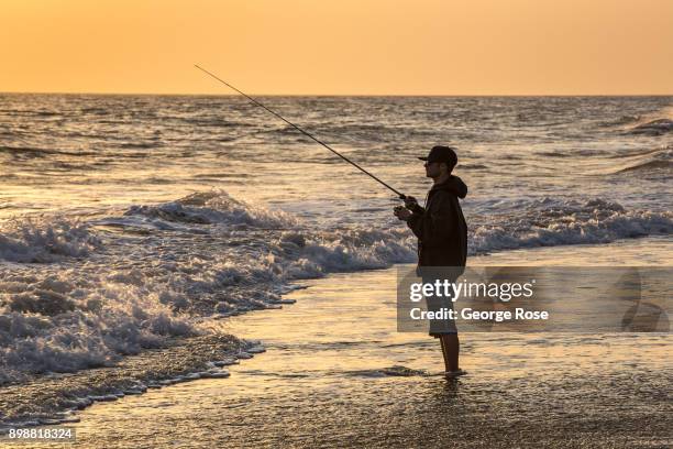 Man fishes in the surf at Gaviota State Park beach on December 18 near Santa Barbara, California. Because of its close proximity to Southern...