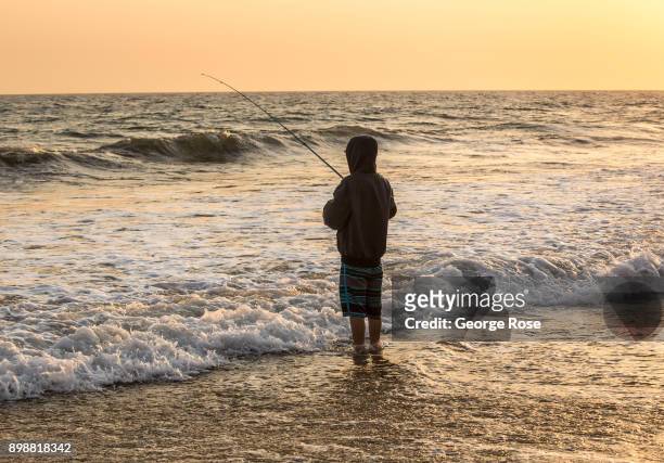 Man fishes in the surf at Gaviota State Park beach on December 18 near Santa Barbara, California. Because of its close proximity to Southern...
