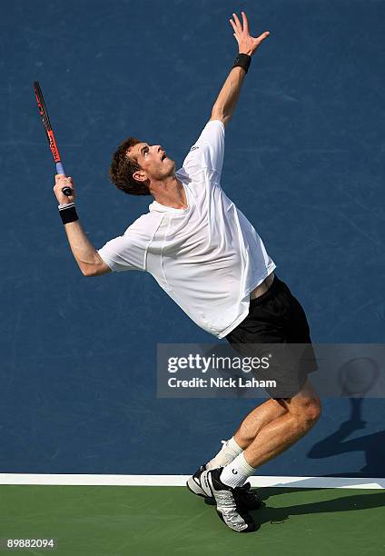 Andy Murray of Great Britain serves against Nicolas Almagro of Spain during day three of the Western & Southern Financial Group Masters on August 19,...