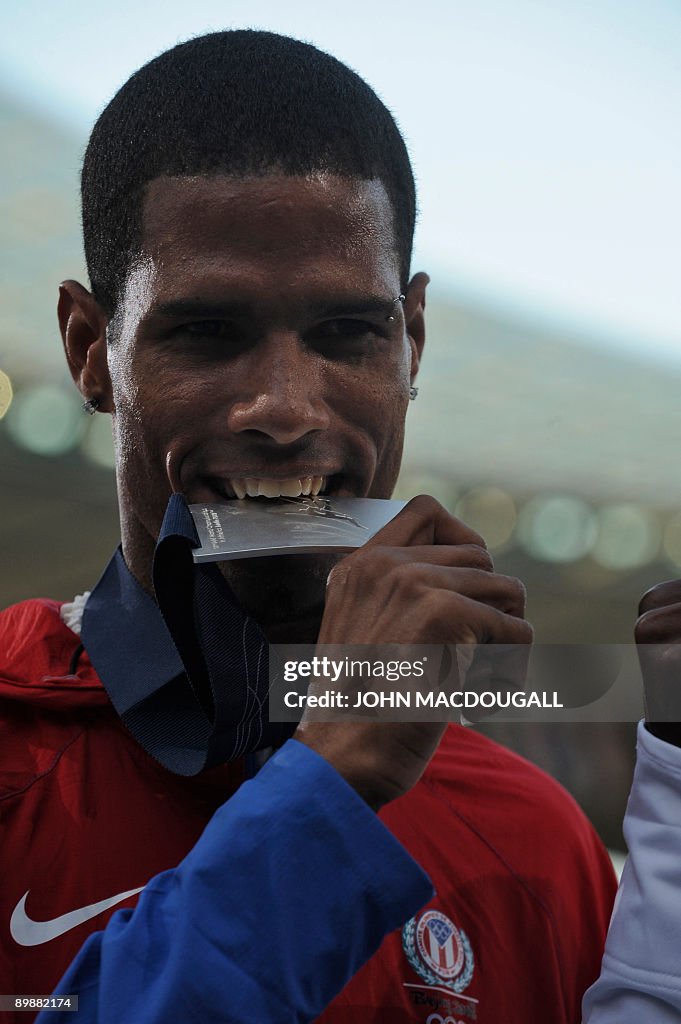 Culson Puerto Rico's Javier Culson celebrates during the men's 400m hurdles ...
