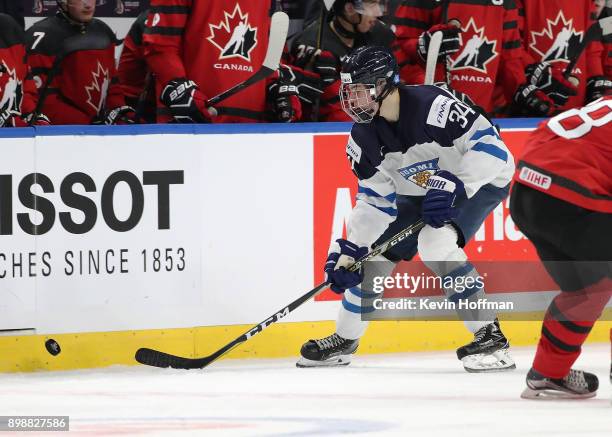 Rasmus Kupari of Finland skates up ice with the puck during the second period against Canada at KeyBank Center on December 26, 2017 in Buffalo, New...
