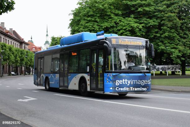 modern cng bus on the street in pärnu - natural gas bus stock pictures, royalty-free photos & images