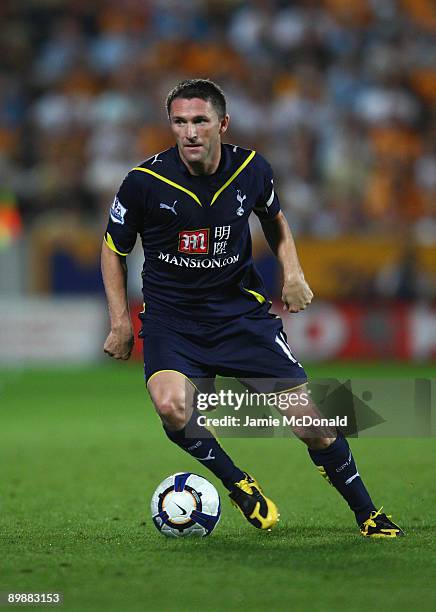 Robbie Keane of Tottenham Hotspur runs with the ball during the Barclays Premier League match between Hull City and Tottenham Hotspur at the KC...