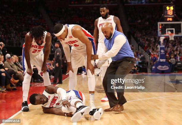 Reggie Jackson of the Detroit Pistons reacts to a third quarter injury during the game against the Indiana Pacers at Little Caesars Arena on December...