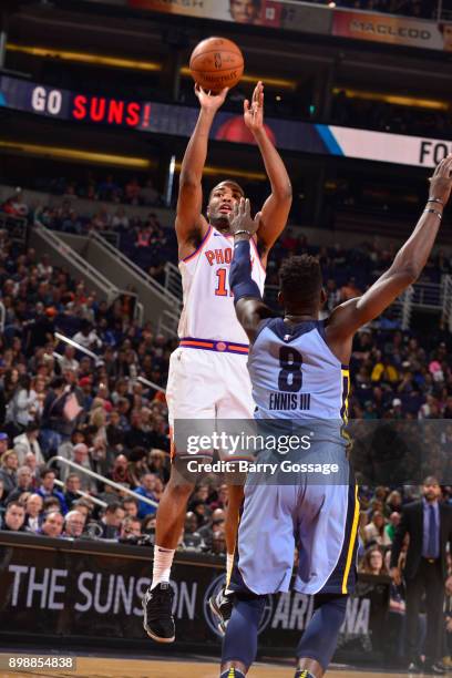 Brandon Knight of the Phoenix Suns shoots the ball during the game against the Memphis Grizzlies on December 26, 2017 at Talking Stick Resort Arena...