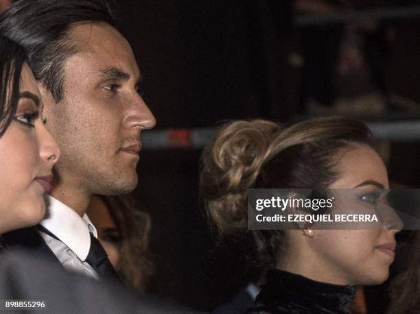 Costa Rica's goalkeeper Keylor Navas , now playing for Real Madrid, and his wife Andrea Salas arrive for the premiere of the movie on his life "Man...