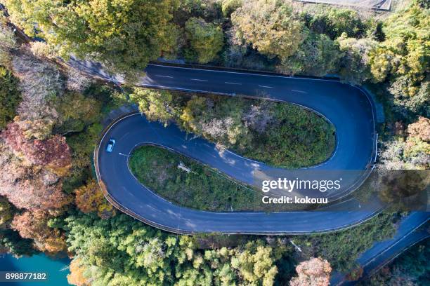 a beautiful curve of the junction. - car top view stock pictures, royalty-free photos & images