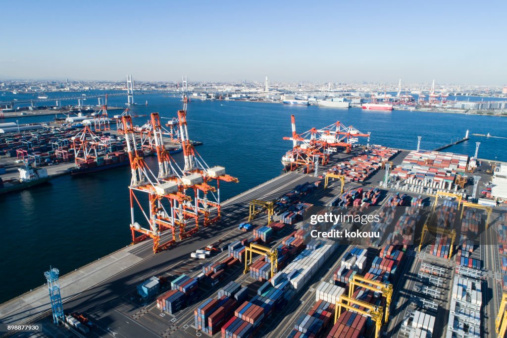 Drone shooting. Harbor, overhead view, sea. Cargo crane.