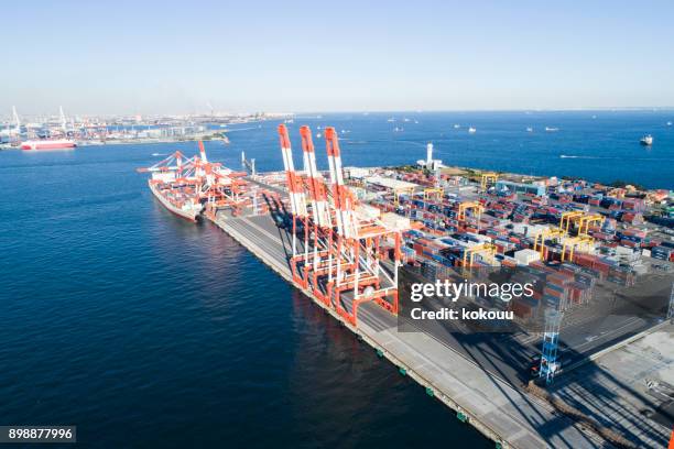 drone shooting. harbor, overhead view, sea. cargo crane. - freeport bahamas stock pictures, royalty-free photos & images