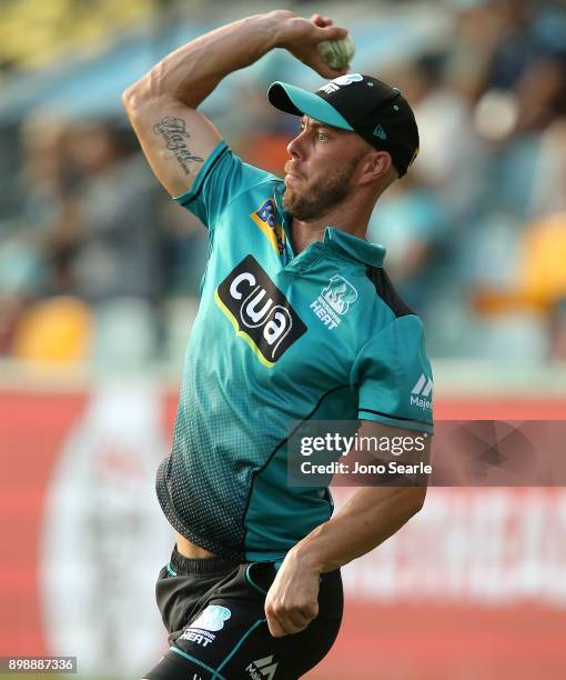 Brisbane player Chris Lynn warms up before the Big Bash League match between the Brisbane Heat and the Sydney Thunder at The Gabba on December 27,...