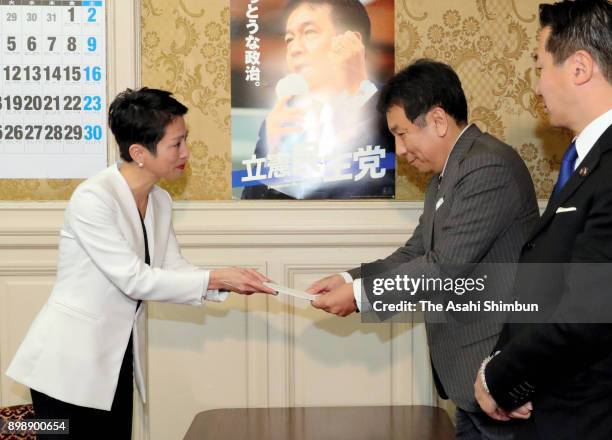 Former Democratic Party leader Renho greets the Constitutional Democratic Party of Japan leader Yukio Edano at the diet building on December 26, 2017...