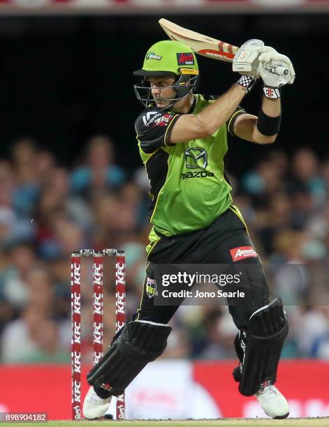 Sydney player Callum Ferguson hits the ball during the Big Bash League match between the Brisbane Heat and the Sydney Thunder at The Gabba on...