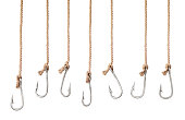 Set of fishing hooks on the ropes isolated on a white background