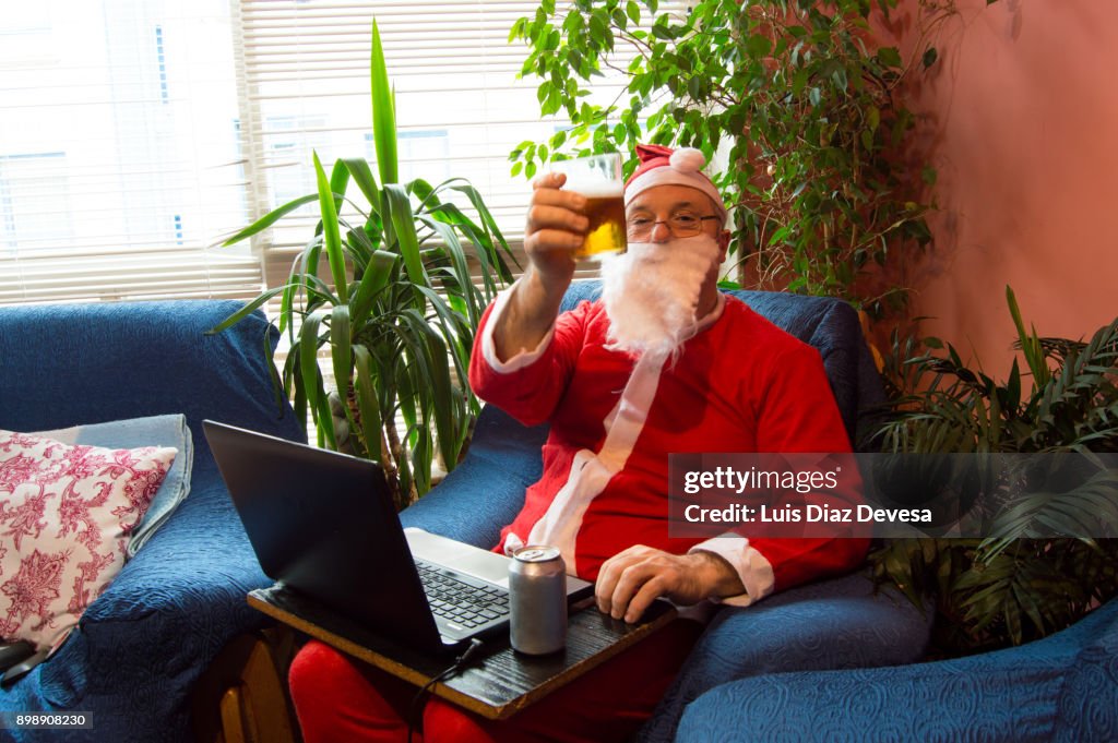 Santa Claus drinking beer