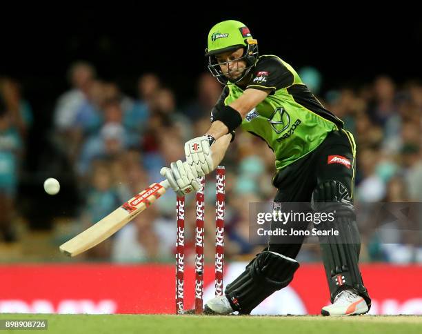 Sydney player Callum Ferguson hits the ball during the Big Bash League match between the Brisbane Heat and the Sydney Thunder at The Gabba on...