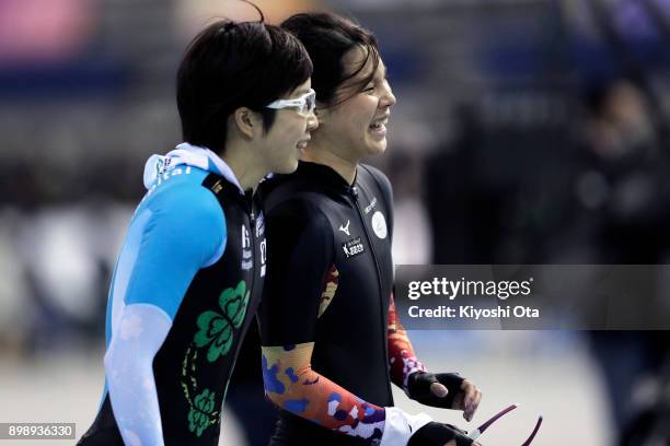 Erina Kamiya reacts after competing with Nao Kodaira in the Ladies' 500m during day one of the Speed Skating PyeongChang Winter Olympics qualifier at...