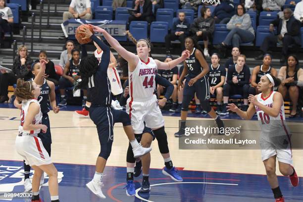 Cecily Carl of the American University Eagles blocks the shot of Teniya Page of the Penn State Lady Lions during a women's college basketball game at...