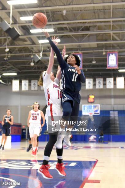 Teniya Page of the Penn State Lady Lions takes a shot over Maria Liddane of the American University Eagles during a women's college basketball game...