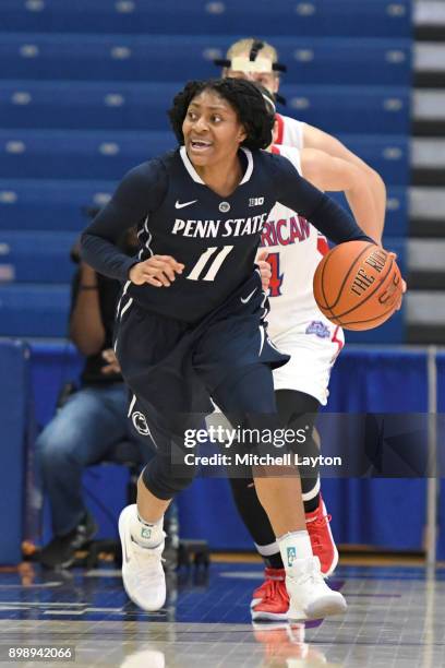 Teniya Page of the Penn State Lady Lions dribbles up court during a women's college basketball game against the American University Eagles at Bender...