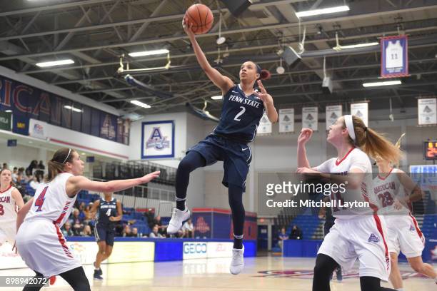 Amari Carter of the Penn State Lady Lions drives to the basket during a women's college basketball game against the American University Eagles at...