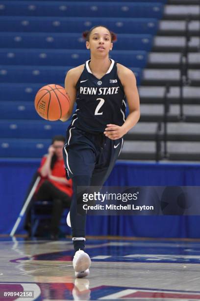 Amari Carter of the Penn State Lady Lions dribbles up court during a women's college basketball game against the American University Eagles at Bender...