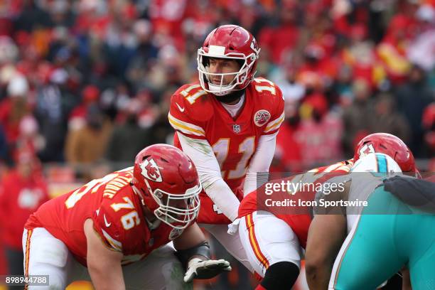 Kansas City Chiefs quarterback Alex Smith prepares to take the snap in the third quarter of a week 16 NFL game between the Miami Dolphins and Kansas...