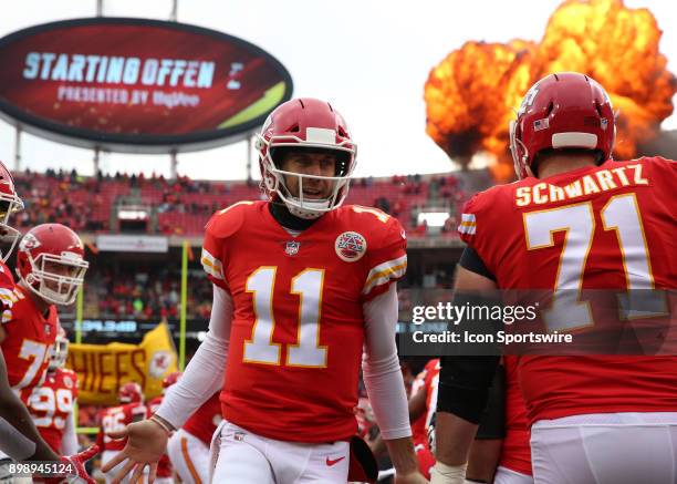 Kansas City Chiefs quarterback Alex Smith running onto the field before a week 16 NFL game between the Miami Dolphins and Kansas City Chiefs on...