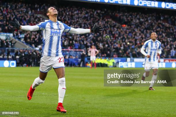 Tom Ince of Huddersfield Town celebrates after scoring a goal to make it 1-0 during the Premier League match between Huddersfield Town and Stoke City...
