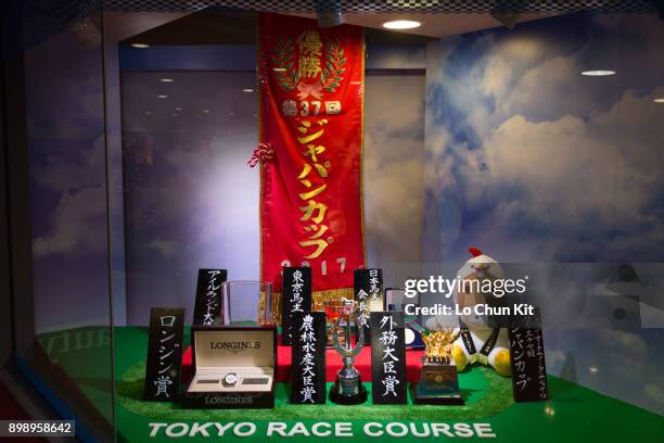 The Japan Cup trophy and souvenirs displayed at Tokyo Racecourse on November 25, 2017.