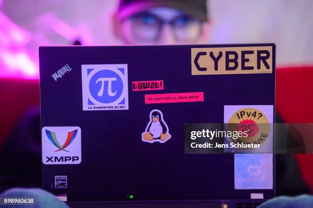 Participant attends the 34C3 Chaos Communication Congress of the Chaos Computer Club on December 27, 2017 in Leipzig, Germany. The annual congress...