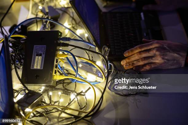Network cables lie on a table during the 34C3 Chaos Communication Congress of the Chaos Computer Club on December 27, 2017 in Leipzig, Germany. The...
