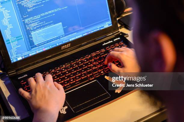 Participant attends the 34C3 Chaos Communication Congress of the Chaos Computer Club on December 27, 2017 in Leipzig, Germany. The annual congress...