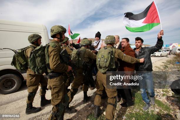 Israeli security forces intervene in Palestinians near Hawara checkpoint, south of the West Bank city of Nablus, during clashes following a...