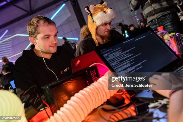 Participants attend the 34C3 Chaos Communication Congress of the Chaos Computer Club on December 27, 2017 in Leipzig, Germany. The annual congress...