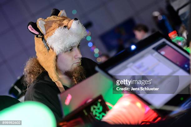 Participant attends the 34C3 Chaos Communication Congress of the Chaos Computer Club on December 27, 2017 in Leipzig, Germany. The annual congress...