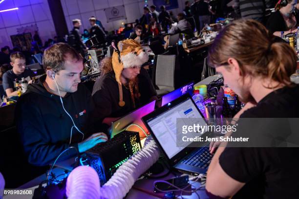 Participants attend the 34C3 Chaos Communication Congress of the Chaos Computer Club on December 27, 2017 in Leipzig, Germany. The annual congress...