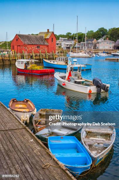 rockport harbor with skiffs and fishing boats - vissersdorp stockfoto's en -beelden