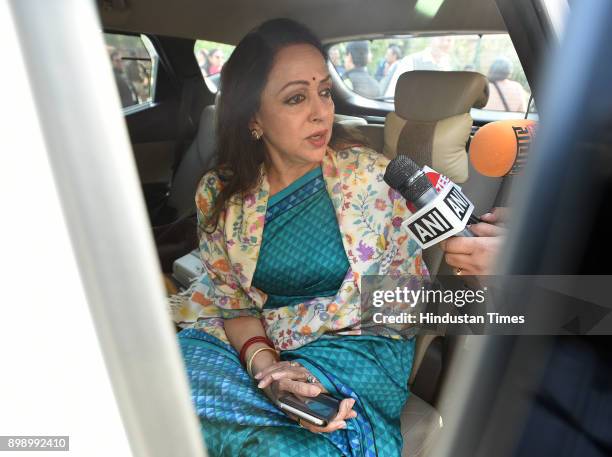 Hema malini Lok Sabha MP from Mathura talking with media person after attending Parliament Winter Session on December 27, 2017 in New Delhi, India....