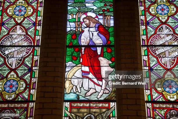 The main windows behind the alter at All Saints Anglican Church, Whitby, was completely destroyed except for a small green leaf, near Jesus's right...