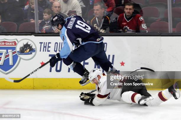 Milwaukee Admirals left wing Justin Kirkland skates past Cleveland Monsters defenceman Andre Benoit during the third period of the American Hockey...