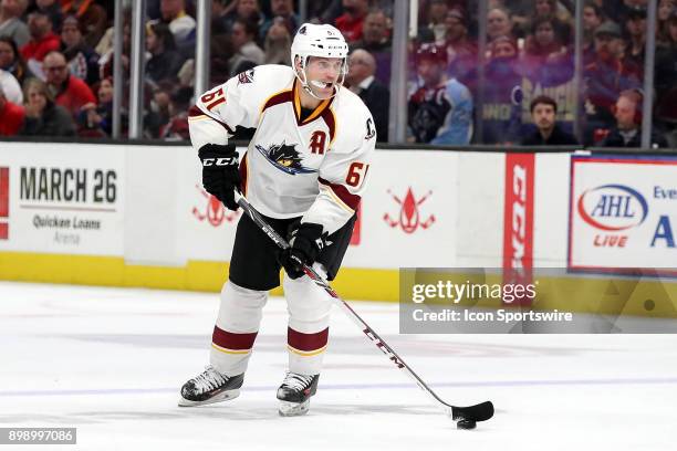 Cleveland Monsters defenceman Andre Benoit looks to pass during the second period of the American Hockey League game between the Milwaukee Admirals...