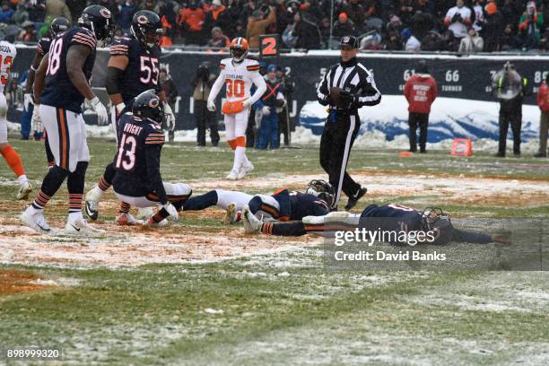 Mitchell Trubisky of the Chicago Bears celebrates his touchdown against the Cleveland Browns during the fourth quarter with Josh Bellamy and Kendall...