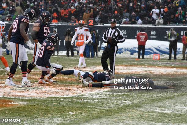 Mitchell Trubisky of the Chicago Bears celebrates his touchdown against the Cleveland Browns during the fourth quarter with Josh Bellamy and Kendall...