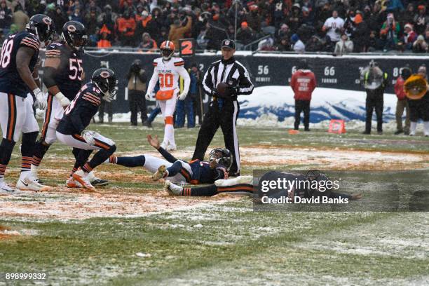 Mitchell Trubisky of the Chicago Bears celebrates his touchdown against the Cleveland Browns during the fourth quarter with Josh Bellamy and Kendall...