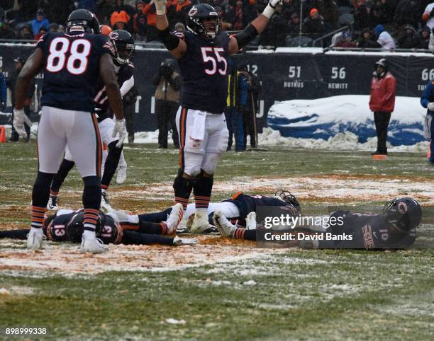 Mitchell Trubisky of the Chicago Bears celebrates his touchdown against the Cleveland Browns during the fourth quarter with Josh Bellamy and Kendall...